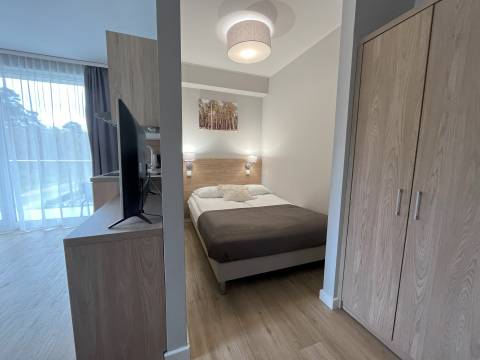 Apartament jednopokojowy z wnęką sypialnianą M24